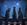 cats looking at the stars sitting on the roof top.